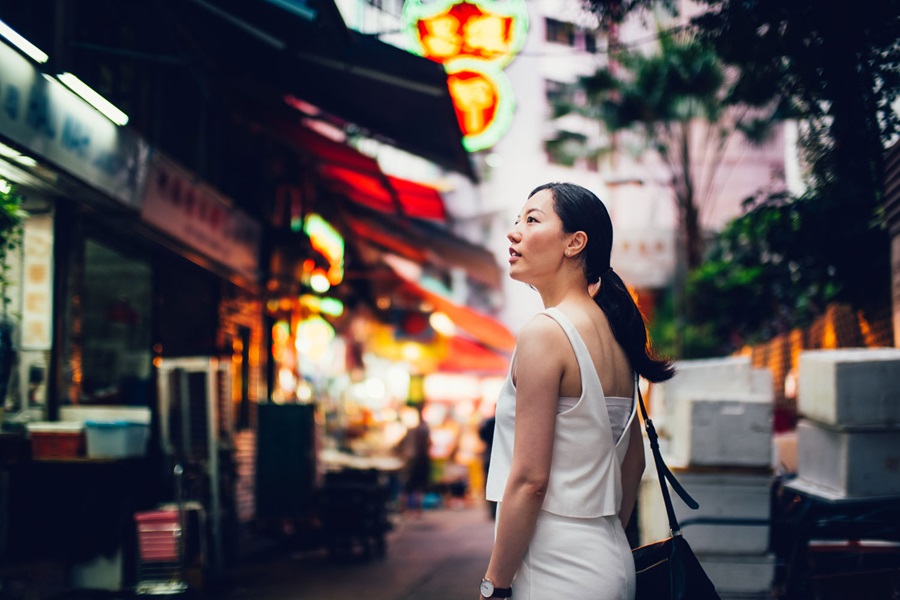 Woman walking down street